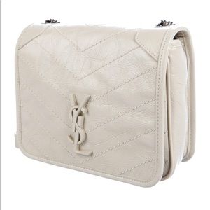 Niki Wallet on Chain, Saint Laurent